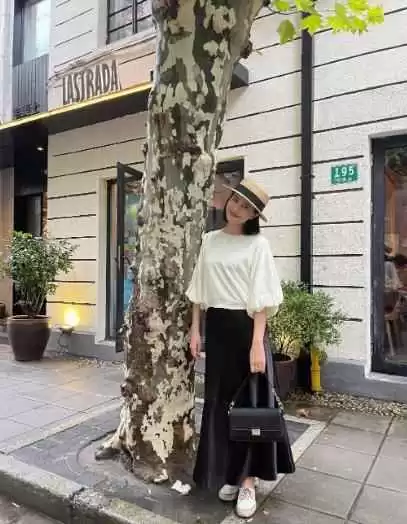 高圆圆穿搭教科书:灯笼袖上衣配缎面裙,轻松穿出女神气质 高圆圆穿搭教科书:灯笼袖上衣配缎面裙,轻松穿出女神气质